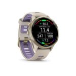 Viedpulksteni Garmin  Forerunner 970, Soft Gold Titanium with French Grey Case and French Grey/Translucent Indigo Band 