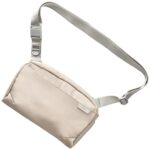 Citas preces UNIQ  Uniq Arden Sling 2L bag - beige 